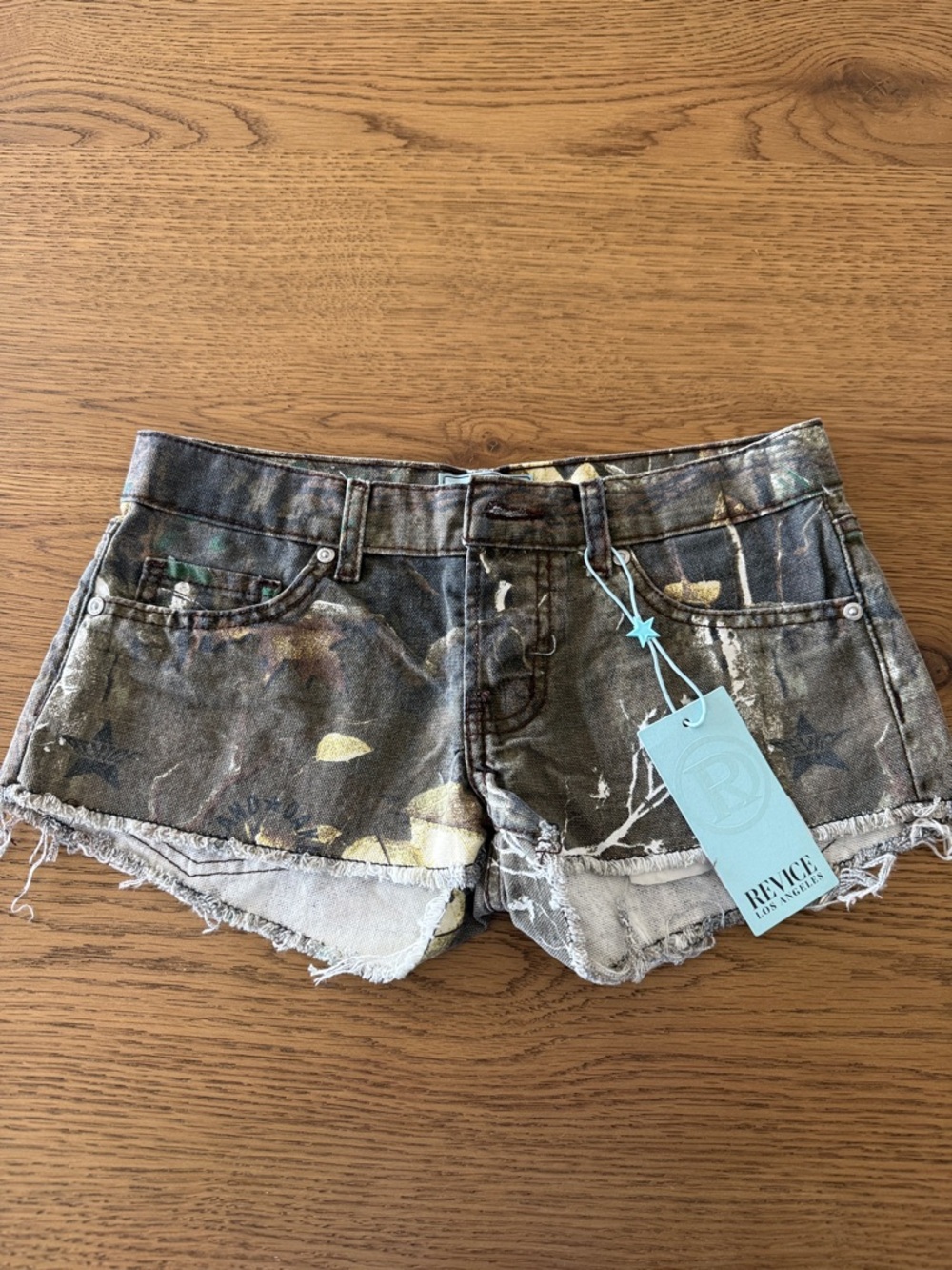 REVICE Olive Camo Paint-Splatter Frayed Denim Shorts
